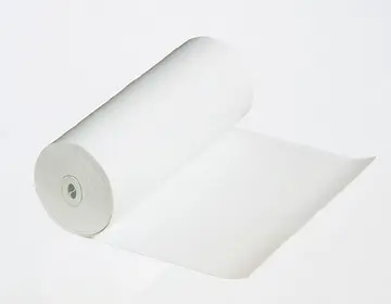 A roll of white paper on a white surface.