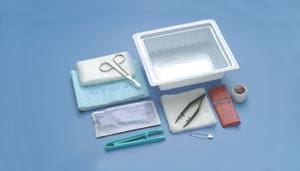 A medical kit with various items on a blue background.