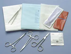 A surgical kit with scissors and other items.