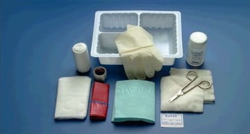 A medical kit with gloves, bandages and other items.