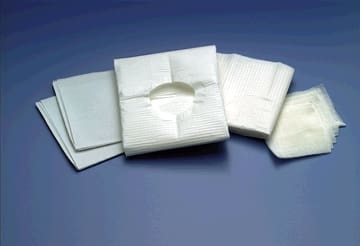 A group of white paper towels on a blue background.