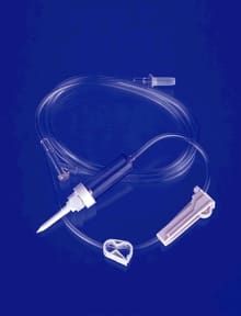 A blue background with a hose and a syringe.