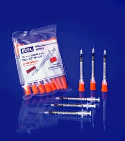 A pack of syringes and needles on a blue background.