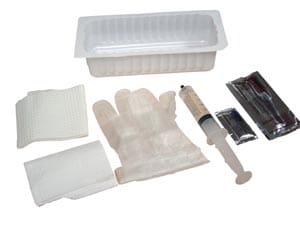 A set of plastic items that include a glove, brush and tray.