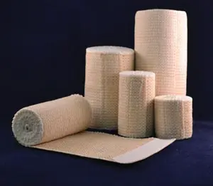 A group of beige bandages on a blue background.