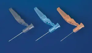 Three plastic needles on a blue background.