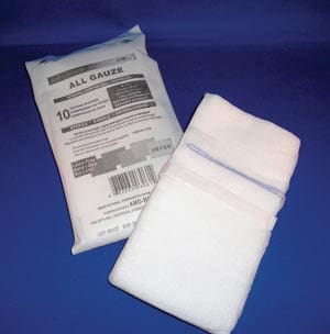 A pair of white towels next to a plastic bag.