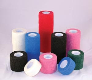 A variety of colored bandages on a white background.