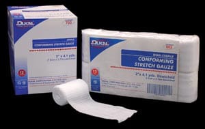 A box of wound dressing tape and a roll of tape.