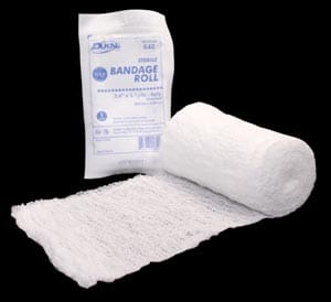 A roll of white bandage on a black background.