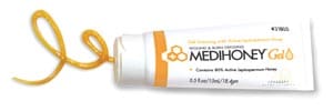 A tube of med honey gel on a white background.