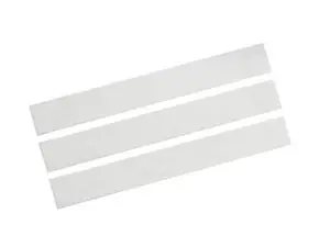 Three strips of white paper on a white surface.