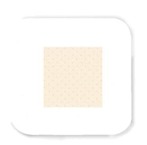 A white square with polka dots on it.