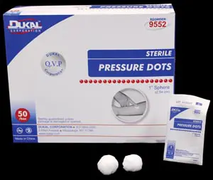 A package of pressure dots and a box.