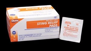 A box of string relief pads on a black background.