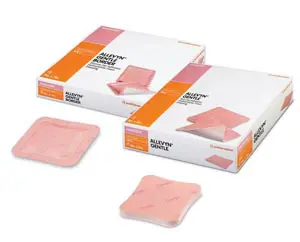 Two boxes of pink bandage pads on a white background.