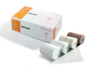 Three rolls of bandage with a box in front of them.