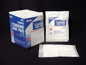 A package of cobaine aid pads and a box.