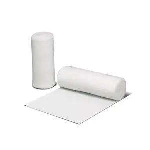 Two rolls of white bandages on a white surface.