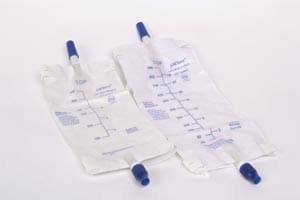 Two bags of urine with blue handles on a table.