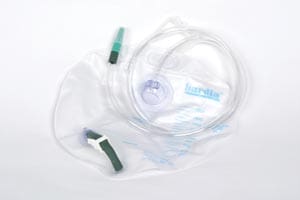 A plastic bag with a tube and two tubes of liquid.