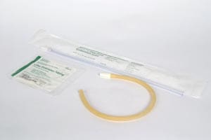 A tube of plastic wrapped in a roll and some bandage.