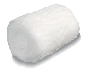 A roll of white wool on a white surface.