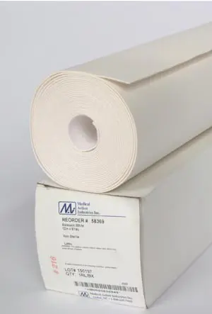 A roll of white paper on a white surface.