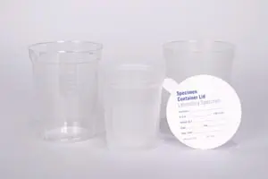 A group of cups with a measuring cup on top.