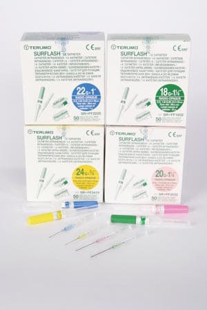 Four boxes of syringes and needles on a white background.