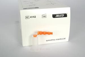 A box with an orange syringe attached to it.