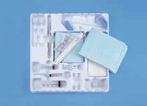 A plastic tray with medical supplies in it.