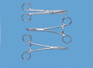 Three pairs of surgical scissors on a blue background.