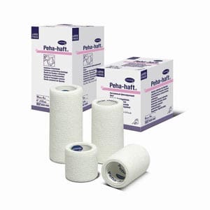 Three rolls of white bandages on a white background.