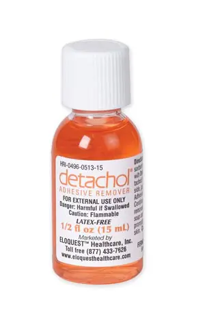 A bottle of detacho orange liquid on a white background.