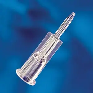 A clear plastic syringe on a blue background.