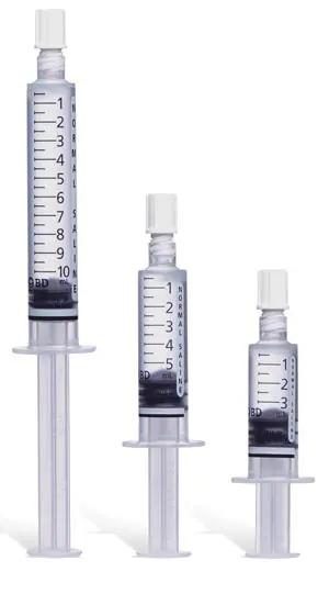 Three syringes on a white background.