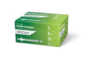 A box of syringes on a white background.