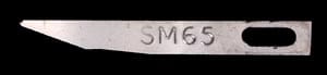 A piece of metal with the word smg5 on it.