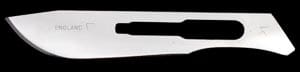 A knife blade on a black background.