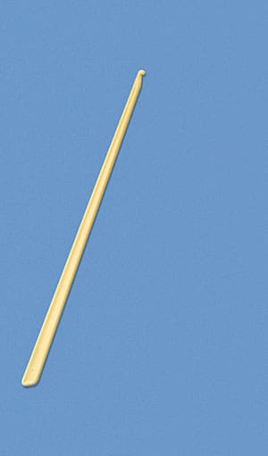 A yellow stick on a blue background.