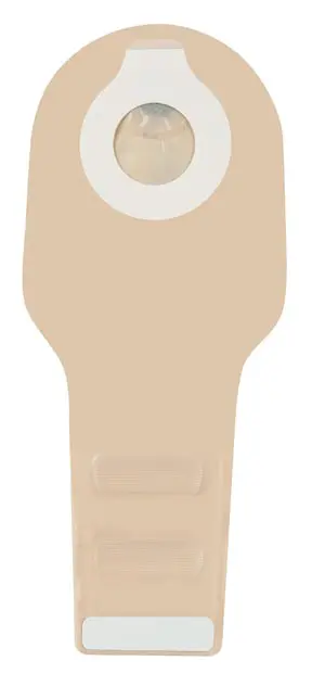 An image of a beige device with a white button.