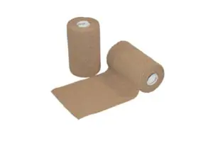 A pair of tan bandages on a white background.