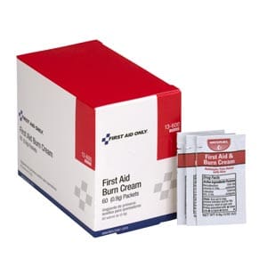 A box of first aid cream in front of a box.