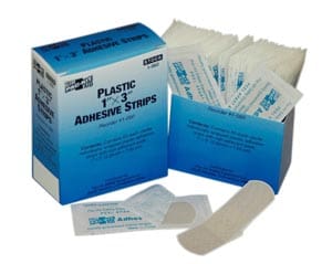 Plastic adhesive strips in a box.