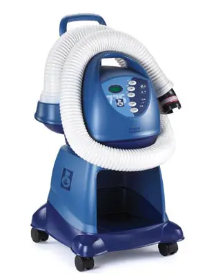 A blue and white machine with a hose attached to it.