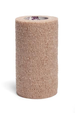 A roll of bandage tape on a white background.