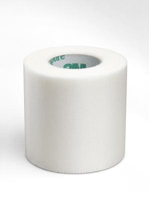 A roll of white tape on a white background.