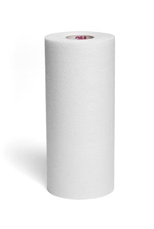 A roll of white toilet paper on a white surface.