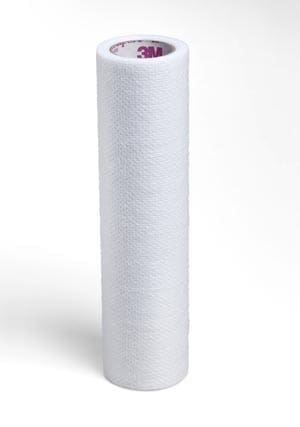 A roll of white bandage on a white background.